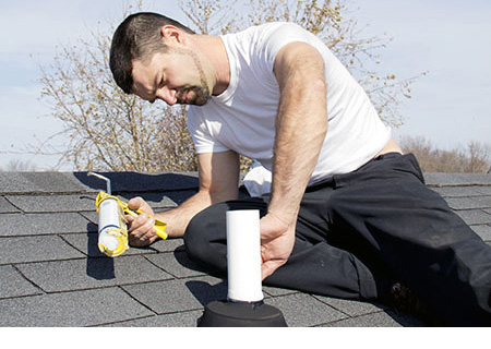 Rooftop plumbing vent pipe to release gases and odors from the property's septic tank.