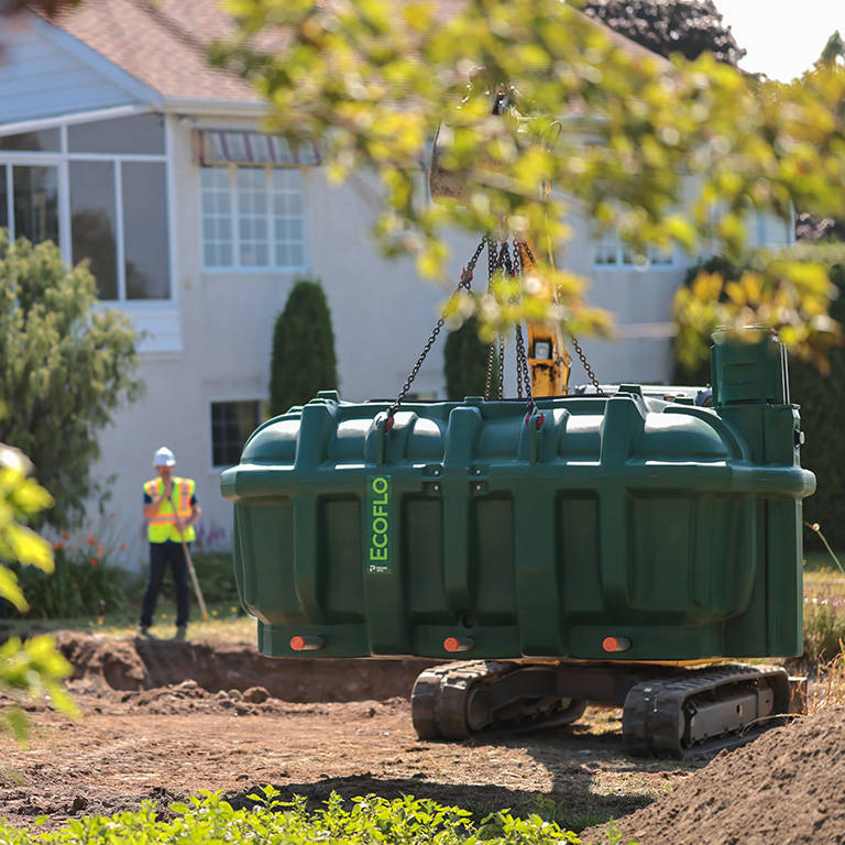 Installation of the polyethylene Ecoflo compact biofilter.