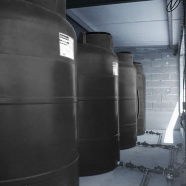 HDPE tanks storing liquid fertiliser on a farm